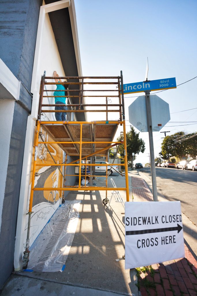 Mural painting on scaffolding